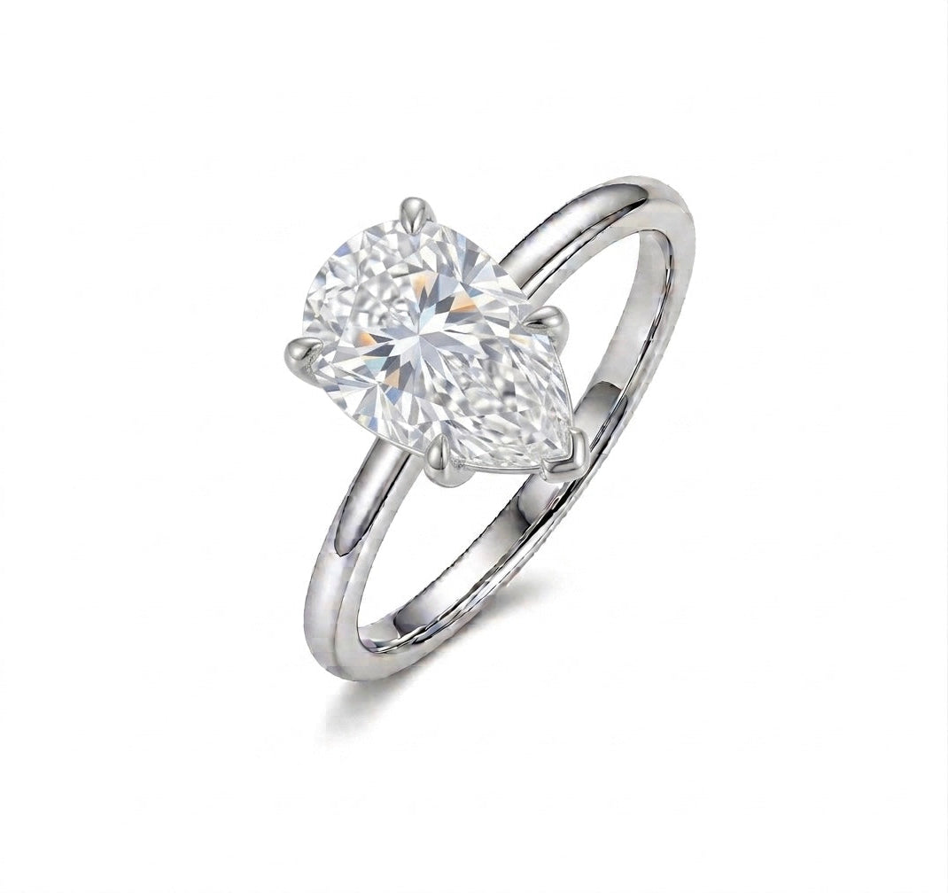 Classic Solitaire Pear cut Diamond Ring (custom)