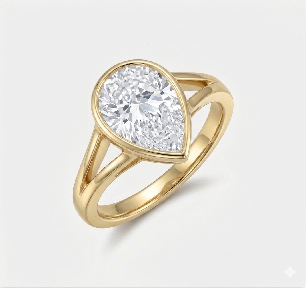 Pear Cut Bezel Split-Shank Solitaire Ring (custom)